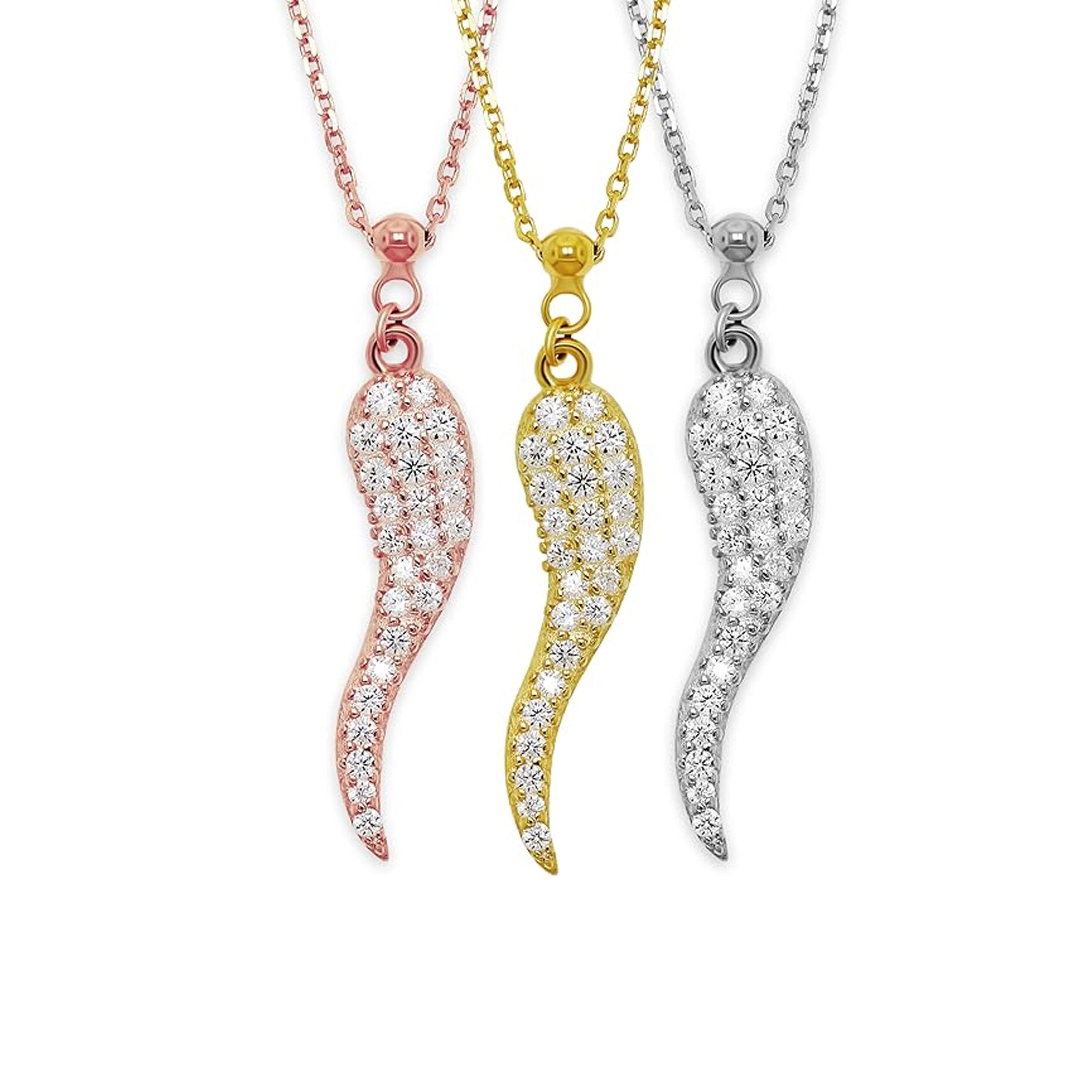 Three Italian horn pendants with cubic zirconia stones on necklaces. Each pendant is gold-plated in a different shade, showcasing the intricate detail and the protective symbol.