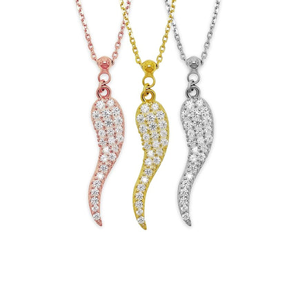 Three Italian horn pendants with cubic zirconia stones on necklaces. Each pendant is gold-plated in a different shade, showcasing the intricate detail and the protective symbol.